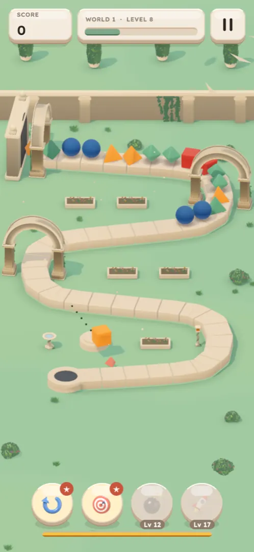 Gameplay: the chain winds round two stone arches with all four shapes